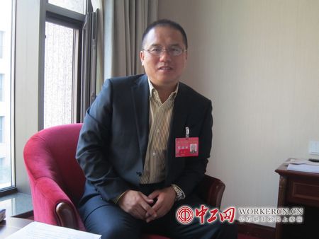 涂冬:构建有效机制 维护农民工权益