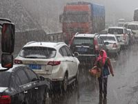 ���������ֲ�������ѩ ���ָ���·�ν�ͨӵ�¡�