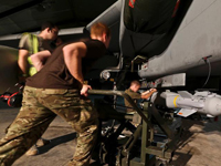 Ӣ������������˹��������װ��Ϯ�ж���