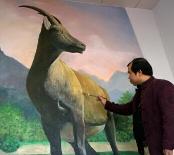 广西画家作“巨羊图”迎春”