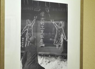 ���¾�֮�����й���ͼƬչ�ڸ��ݾ��С�