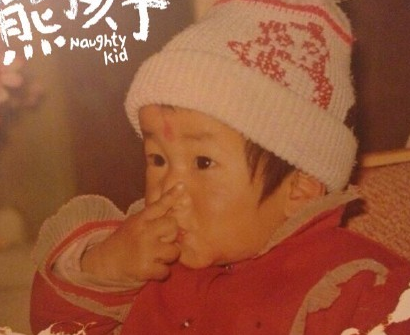 吉克隽逸晒童年照 女大十八变自认儿时很丑”