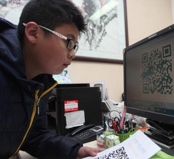 西安一小学尝试用二维码交作业 节省纸张促交流”
