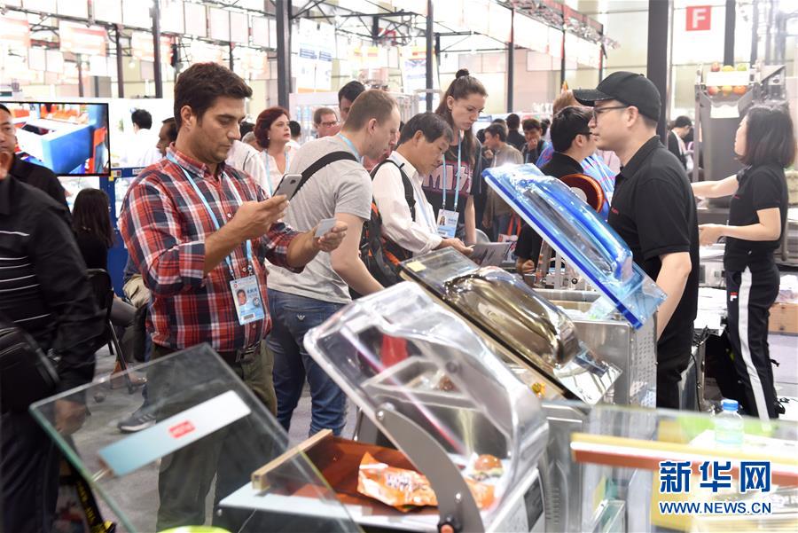 (新华全媒头条·图文互动)(2)面向未来 携手前行——从第123届广交会看中国扩大开放