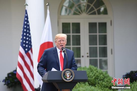 当地时间6月7日,美国总统特朗普(右)在白宫会见日本首相安倍晋三,并共同会见记者。图为特朗普出席联合记者会。 <a target='_blank' href='http://www.chinanews.com/'>中新社</a>记者 刁海洋 摄