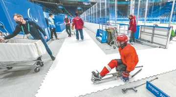 “有路的地方就有盲道”，冬残奥村里处处无障碍