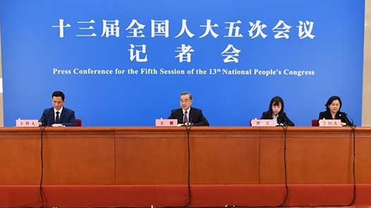 王毅谈中美关系：用“三原则”替“三分法”