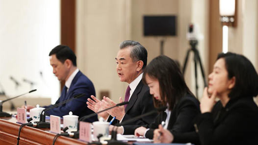 国务委员兼外交部长王毅就中国外交政策和对外关系回答中外记者提问