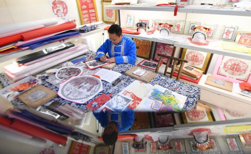 两会·热点画报：巩固拓展脱贫攻坚成果 推动乡村振兴