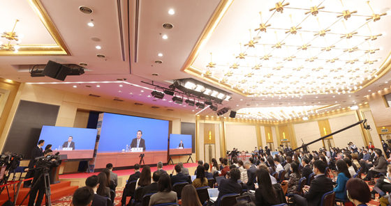 总理记者会：中美双方既然互相打开了大门，就不应再关上，更不能脱钩