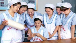 工匠汇·第二批中国纺织大工匠｜何菲：传承“梦桃精神”