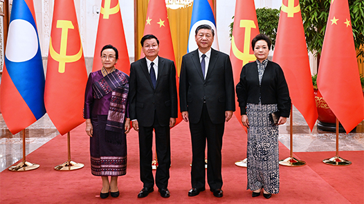 习近平举行仪式欢迎老挝人民革命党中央总书记、国家主席访华
