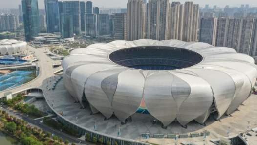 亚运“首金”的人和事