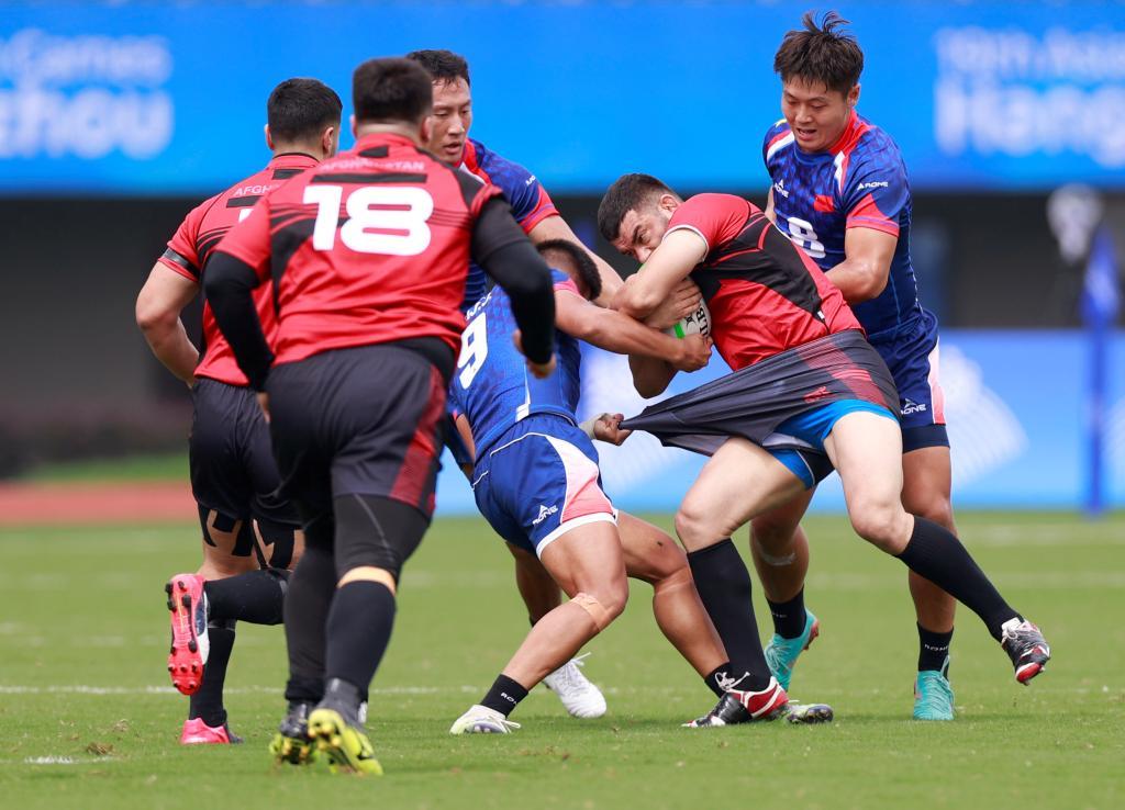 七人制橄榄球比赛首日中国队四战全胜