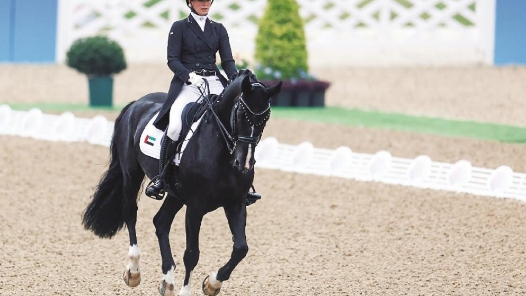 她带着另一半的梦想翩翩起舞