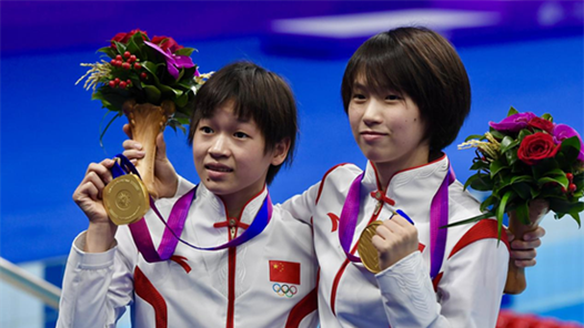 跳水综合：“水花消失术”再现 中国跳水日进两金