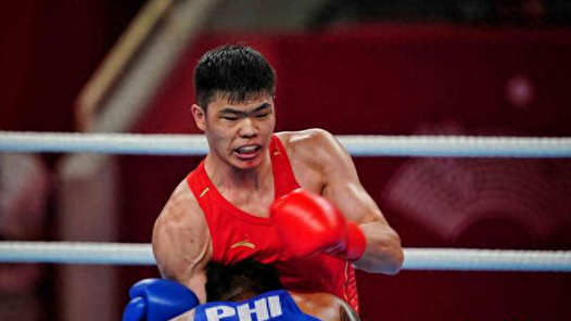 夺金瞬间丨拳击——男子80公斤级：托合塔尔别克·唐拉提汗夺冠