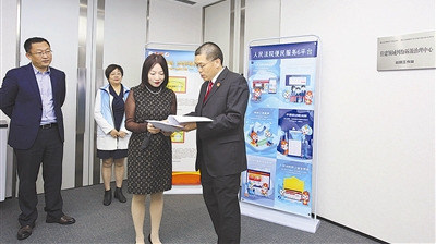 全国人大代表钟铮——绘就住建领域诉源治理新“枫”景