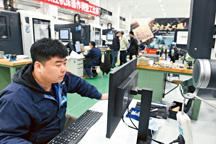 2023年3月19日,第三届“北京大工匠”选树活动多工序数控机床操作调整工比赛现场,来自航空航天、合资、市属企业等多家单位的16名选手同场竞技 2023年3月19日,第三届“北京大工匠”选树活动多工序数控机床操作调整工比赛现场,来自航空航天、合资、市属企业等多家单位的16名选手同场竞技