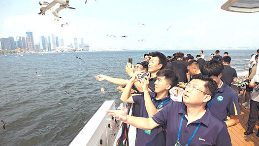 以球为媒感受大连之美