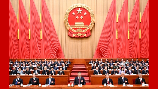 十四届全国人大三次会议在京开幕 习近平等在主席台就座