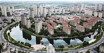 政府工作报告提出“更大力度促进楼市股市健康发展”