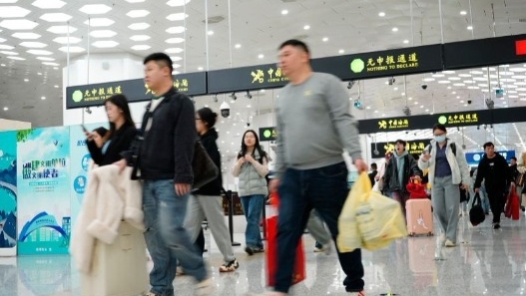 两会财经眼之一｜敞开大门，与世界“双向奔赴”