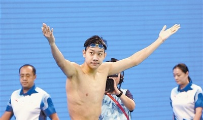 张展硕加冕“三金王”