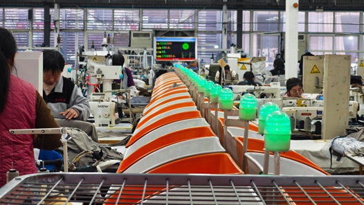 新春走基层｜山东汶上：服装产业从织造到“智造”