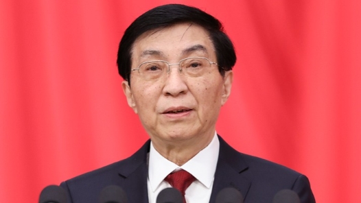 现场实录：王沪宁代表政协第十四届全国委员会常务委员会作工作报告