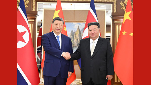 习近平同金正恩举行会谈